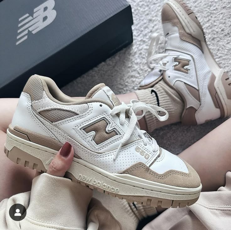 Side profile of the New Balance 550 Brown and White, highlighting its signature "N" logo, sturdy midsole, and clean color contrast.