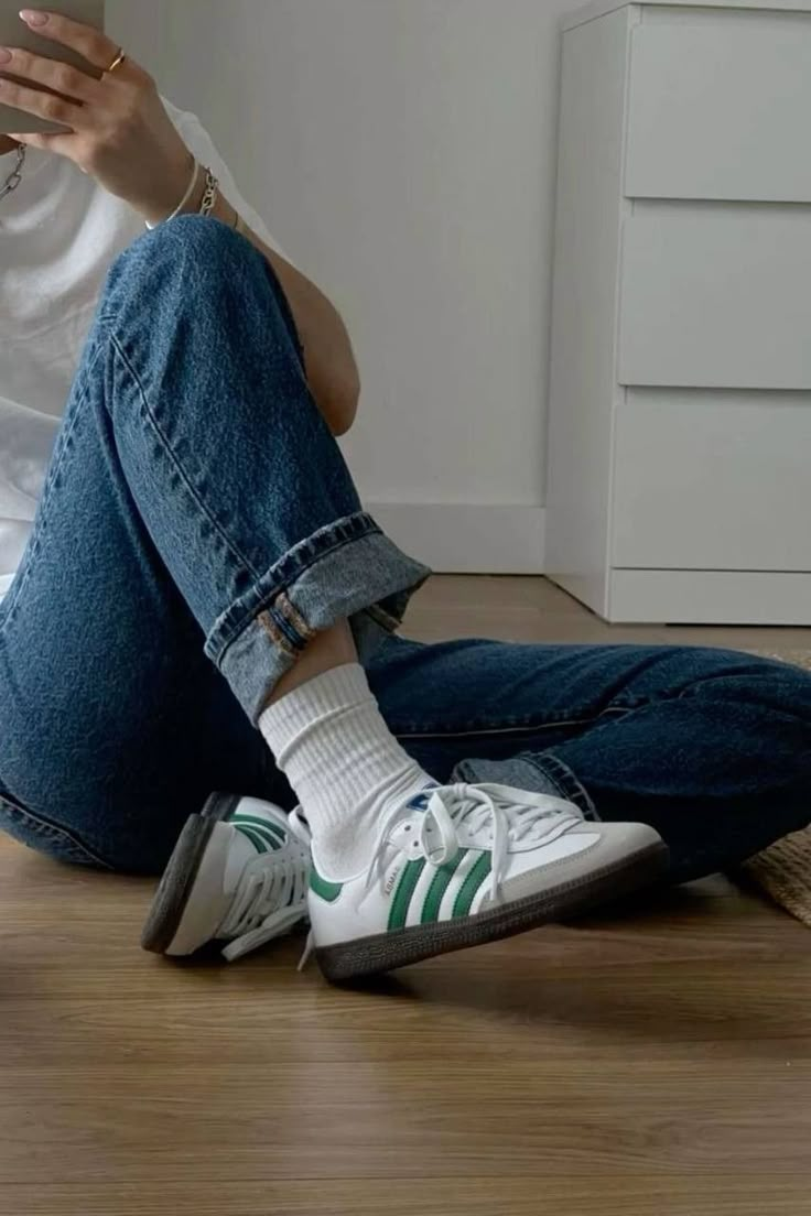 Adidas Samba OG Green White worn on feet, emphasizing its stylish versatility, everyday comfort, and vintage appeal.

