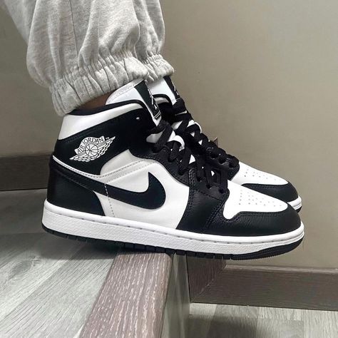 Jordan 1 Retro High '85 OG Black and White worn on feet, emphasizing its retro appeal, premium craftsmanship, and everyday versatility.

