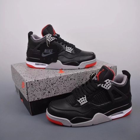 Side profile of the Jordan 4 Red and Black Reimagined, highlighting its bold red overlays, black midsole, and signature Jumpman logo.

