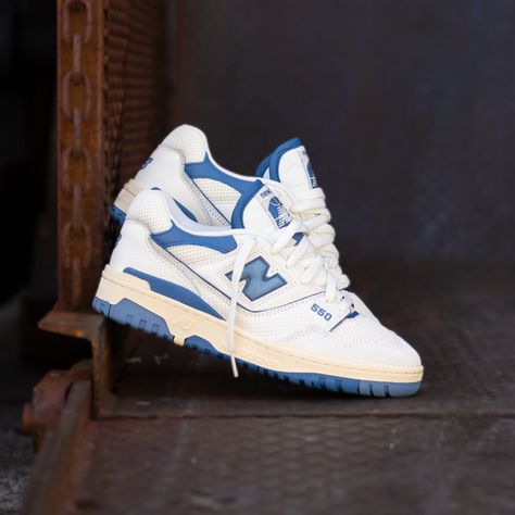 New Balance 550 Blue worn on feet, emphasizing its retro appeal, stylish versatility, and all-day comfort.

