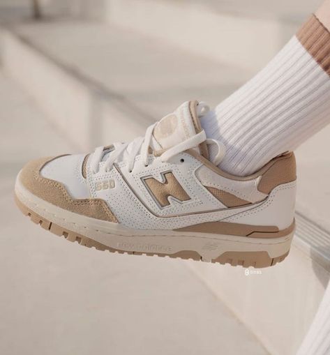 New Balance 550 Brown and White worn on feet, emphasizing its classic appeal, stylish versatility, and everyday comfort.

