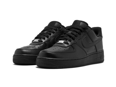 Close-up of the Nike Air Force 1 Black, showcasing its sleek leather upper, perforated toe box, and low-top design.

