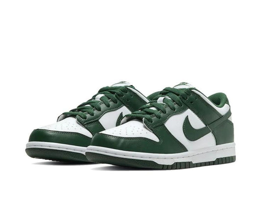 Close-up of the Nike Dunk Low Green, showcasing its vibrant green leather upper and breathable perforated toe box.