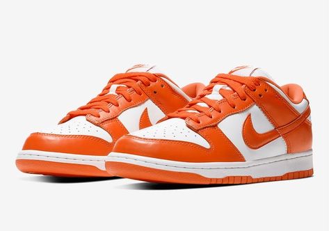 Close-up of the Nike Dunk Low Orange, showcasing its vibrant orange leather upper and breathable perforated toe box.