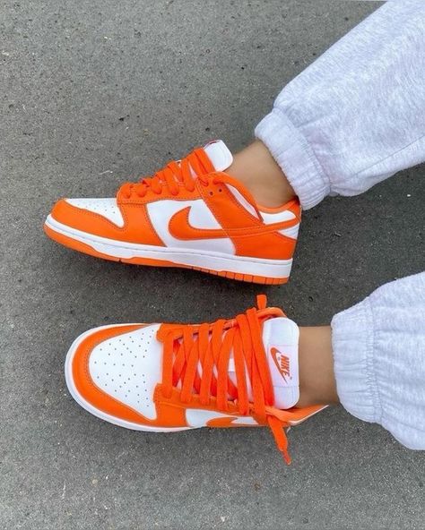 Nike Dunk Low Orange worn on feet, emphasizing its bold style, affordability, and everyday comfort.