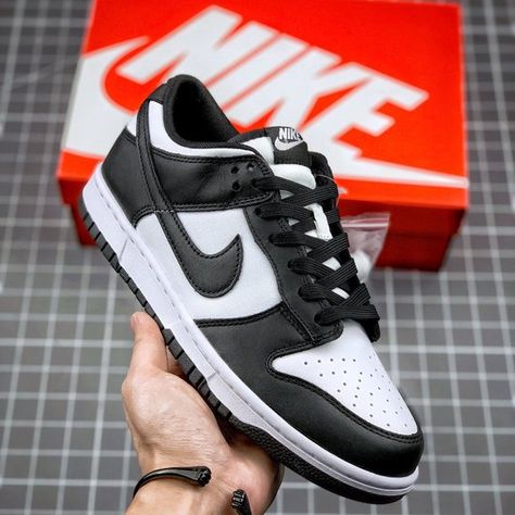 Nike Dunk Low Panda worn on feet, emphasizing its stylish versatility and timeless street appeal.