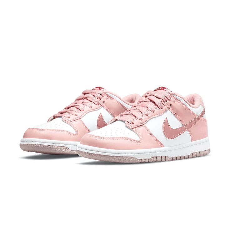 Close-up of the Nike Dunk Low Pink, showcasing its premium pink leather upper and breathable perforated toe box.