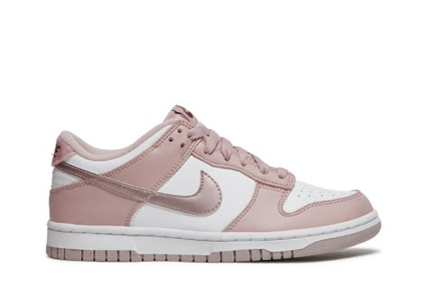 Side profile of the Nike Dunk Low Pink, highlighting its soft pastel tones, classic Nike Swoosh, and sleek low-top silhouette.